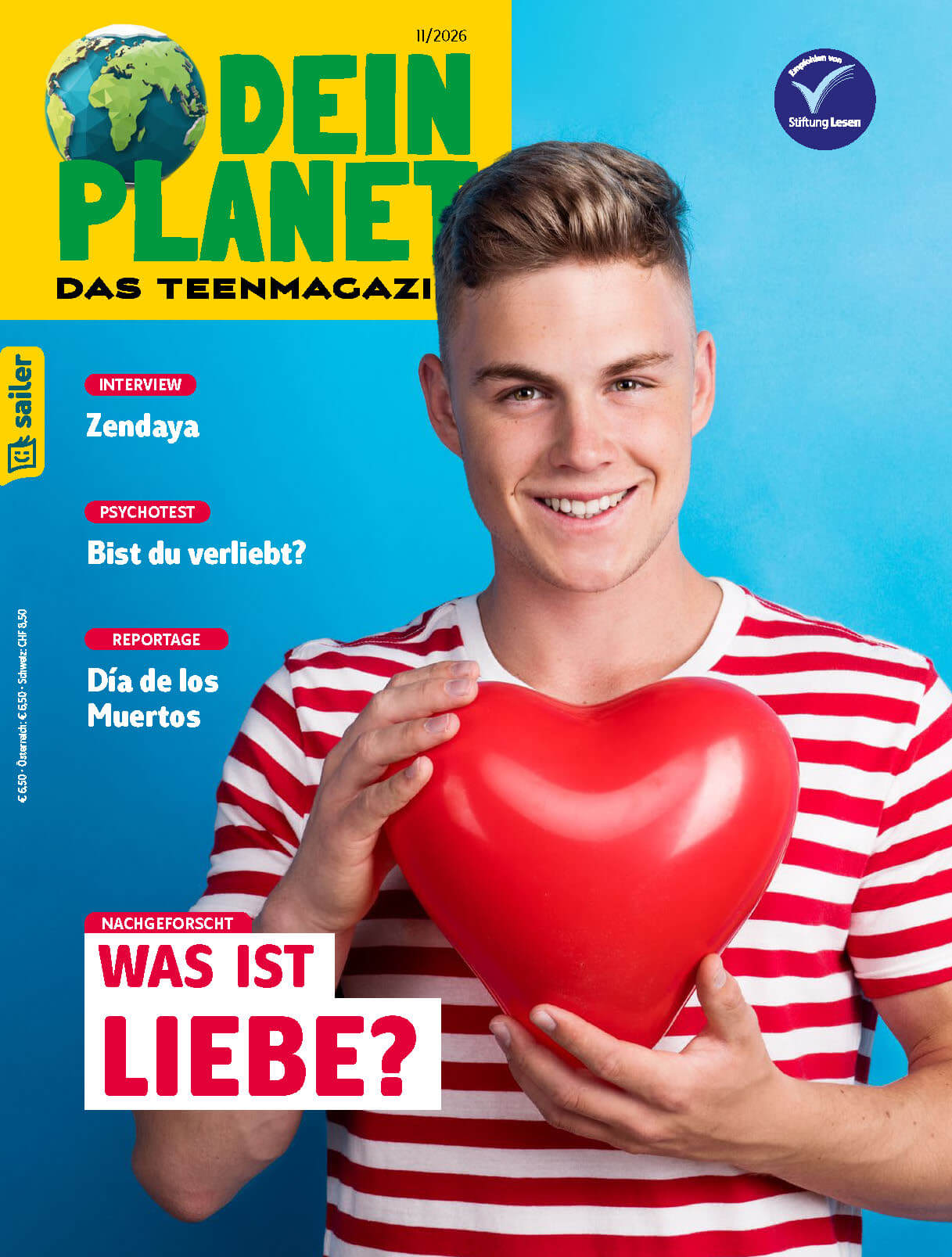 Dein_Planet_11-2026_Cover Das Cover des Magazins 'Dein Planet - Das Teenmagazin' Ausgabe II/2026. Ein junger Mann in einem rot-weiß gestreiften T-Shirt hält ein großes rotes Herz aus Kunststoff. Oben steht der Titel des Magazins in großen grünen Buchstaben vor einem blauen Hintergrund, daneben das Logo der Stiftung Lesen. Links sind Themen wie ein Interview mit Zendaya, ein Psychotest 'Bist du verliebt?' und eine Reportage 'Día de los Muertos' aufgelistet. Unten ein rotes Textfeld mit der Frage 'Was ist Liebe?'
